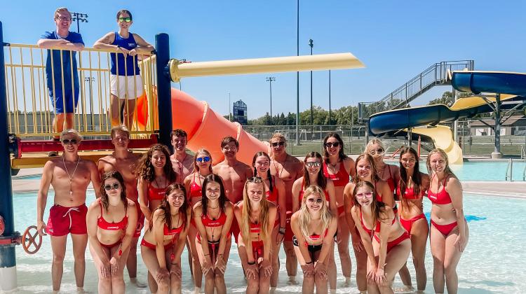 North2.jpg Lifeguards at the Roger E. Gress Northside Outdoor Pool standing on the aquatic playground lined up for a picture.