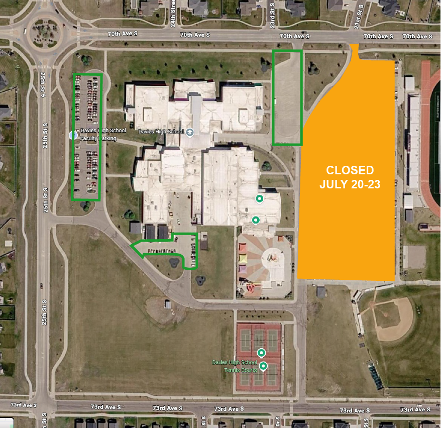 Aerial map of Davies High School showing a designated construction detour route. Green arrows direct traffic south on 25th Street South, east on 73rd Avenue South, and north into the southeast entrance near the student parking lot. A red line marks a closure or restricted access point along 70th Avenue South near the northeast side of campus. The school building, parking lots, tennis courts, and surrounding streets are labeled.