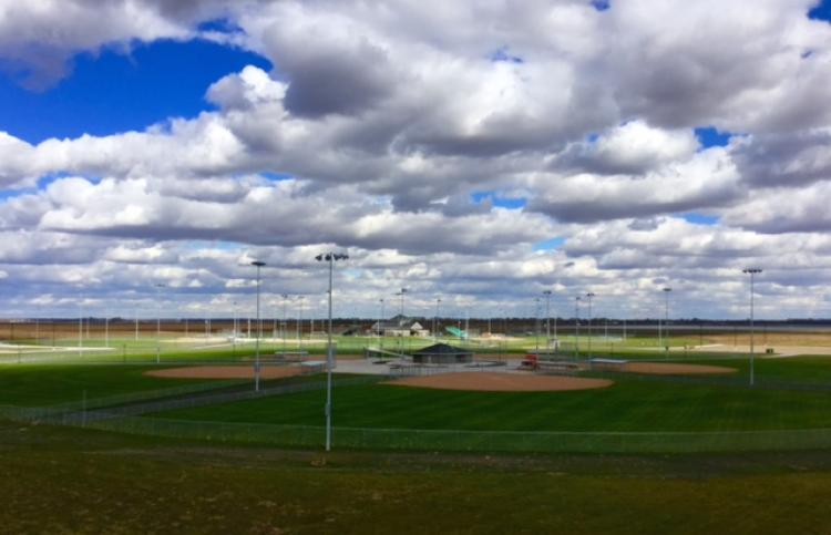 northsoftballcomplex2015 This image shows an aerial view of the concessions building and diamonds at North Softball Complex.