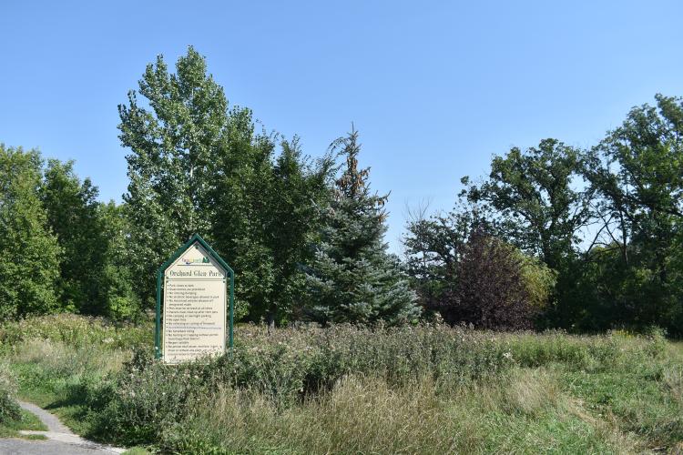 This image shows the entrance of Orchard Glen Park