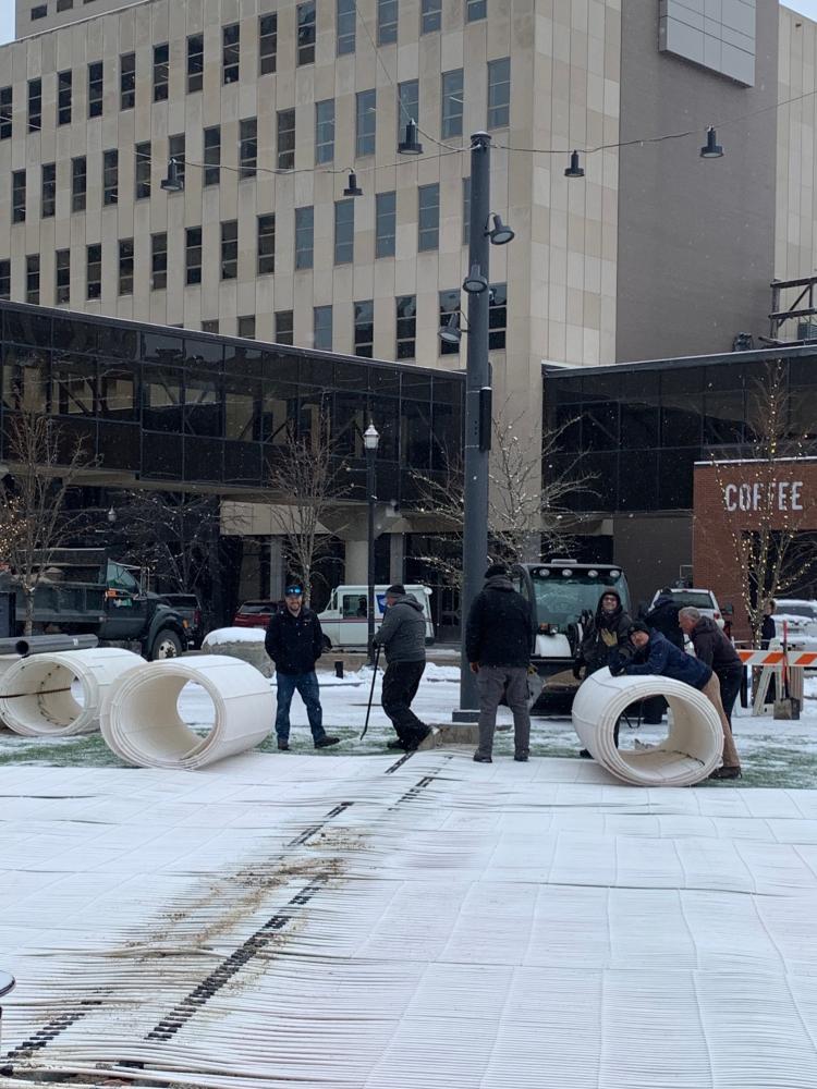 Crews laying skating rink at Broadway Square