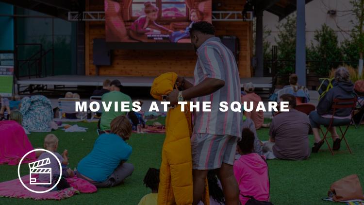 Movie at The Square.jpg Families getting ready to sit down and enjoy an outdoor movie at Broadway Square - MOVIES AT THE SQUARE - with a clappboard
