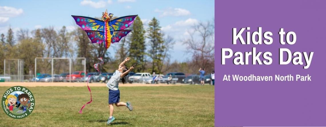 This image shows a young girl flying a kite during Kids to Parks Day.