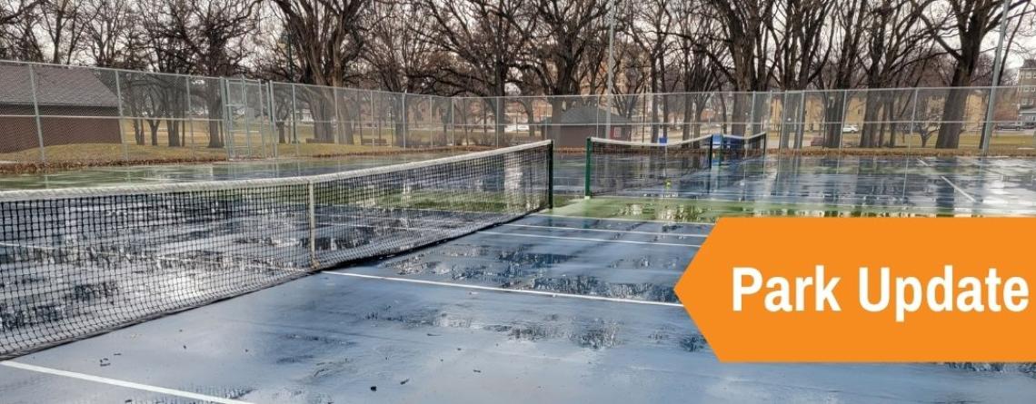 This image shows tennis courts with nets in place with an orange arrow and text reading Park Update.