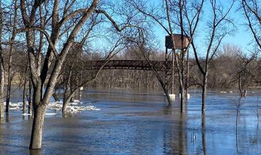 pedestrian bridge raised to avoid high water levels from the red river