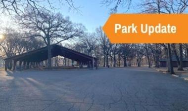 This image shows a photo of the Oak Grove Park parking lot.
