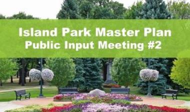 This image shows the Island Park flower beds with a green graphic bar with white text reading Island Park Master Plan Public Input Meeting #2