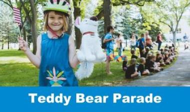 This image shows a graphic of "Teddy Bear Parade" with a photo of a smiling little girl wearing a bike helmet and blue dress holding a stuffed animal and waving a mini American flag.