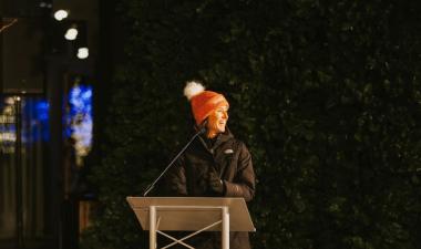 Photo of susan faus speaking at holiday tree lighting event