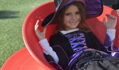 Girl in witch costume at Square Scare event