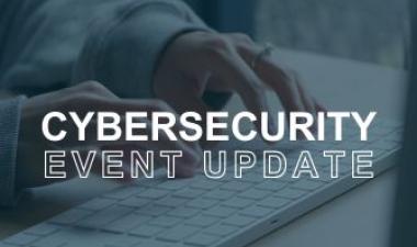 Hands typing on a keyboard with the words - Cybersecurity Event 