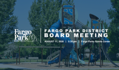 This image shows a playground with text that reads "Fargo Park District Board Meeting, August 11, 5:30PM, Fargo Parks Sports Center."