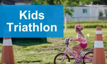 This image shows a graphic of "Kids Triathlon" with a photo of a young girl riding a pink bike and wearing a pink helmet.