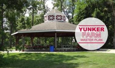 This photo shows the gazebo at yunker farm with text that says yunker farm master plan