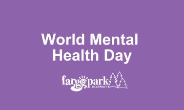 Purple background with white text that says World Mental Health Day. White Fargo Parks logo