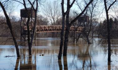 photo of Lindenwood Park bridge with flooding present