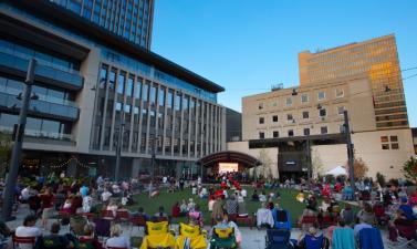 Photo of people enjoying music at broadway square