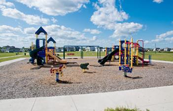 This image shows the playground at Deer Creek Park.