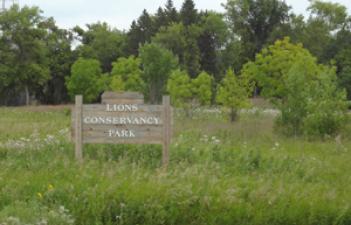 This image shows the sign at the entrance of Lions Conservancy Park.