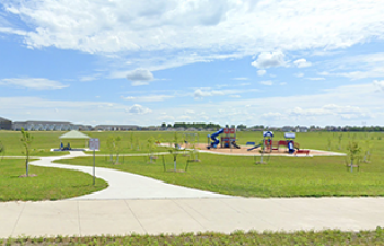 This image shows the playground at Prairie Farms Park.