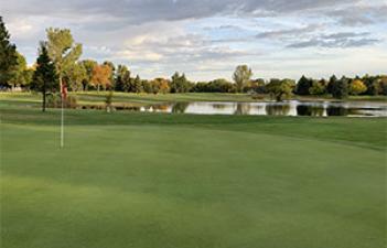 This image shows the green on one of the holes at Prairiewood Golf Course.
