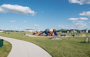 This image shows the playground at The Pines Park.