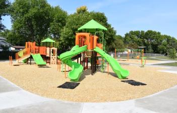 This image shows green and orange playground equipment
