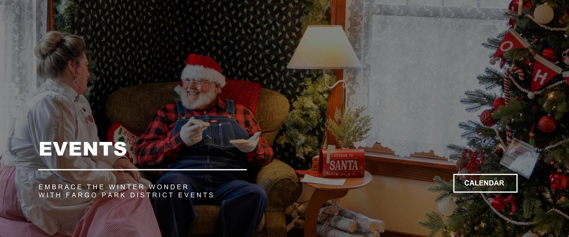 Santa & Mrs. Claus sitting in chairs, talking and eating cookies in a house next to a lamp and christmas tree - EVENTS - Embrace the winter wonder with Fargo Park District Events - CALENDAR button on the right