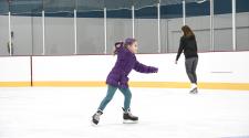 This image shows a girl ice skating.