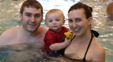 This image shows a family at open swim.