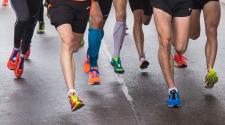 Photo shows legs of running group
