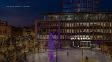 This image shows a photo of the new skate shack location with an arrow